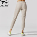 2020 Jiejin Gym Fitness Jogger Pantalones de jogger de color sólido Pantalones de sudor